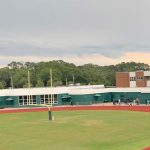 A 19-year-old man who'd been involved in an altercation off campus jumped a fence onto Flagler Palm Coast's athletic fields this afternoon before he was apprehended. (© FlaglerLive)